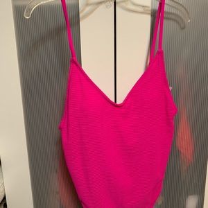Hot Pink swimsuit.